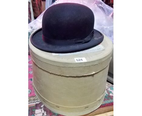 Vintage bowler hat by Woodrow, Piccadilly, London, within original fitted cardboard hat box.