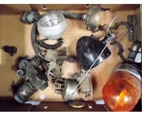 Box of vintage vehicle parts including a headlamp, AA car badge, etc.,