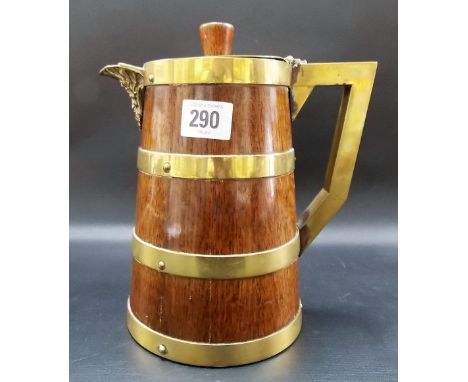 Oak brass coopered hinge lidded wine jug with Bacchus flask spout, height 9in