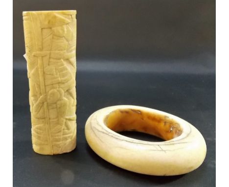 Antique ivory bangle; together with a Japanese bone carved dagger handle, carved with Samurai (2).