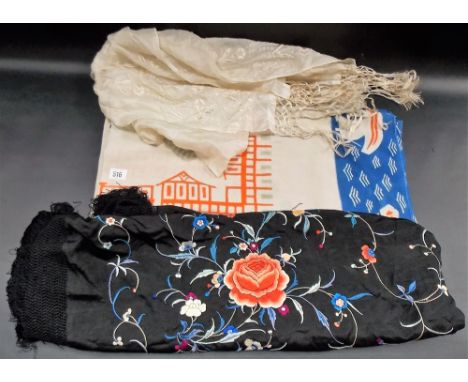 Vintage black cotton and foliate coloured silk embroidered shawl with tassels, together with a silk foliate embroidered scarf