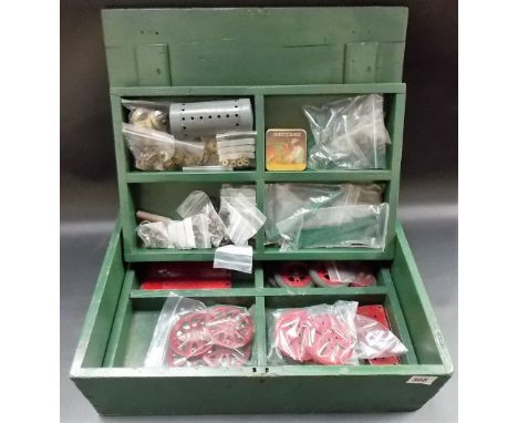 Vintage Meccano parts in a green painted fitted pine box 