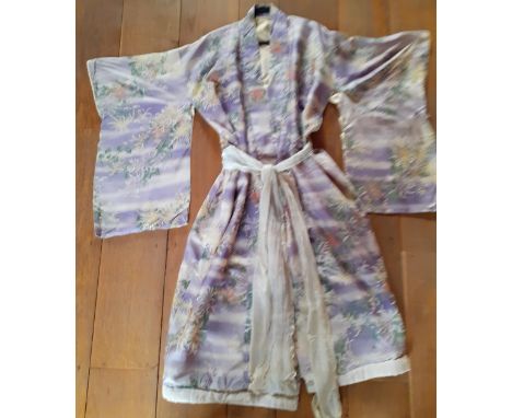 A 1930's/1940's Japanese silk kimono in pale lilac with Batik images of honeysuckles and leaves, having a cream silk lining a