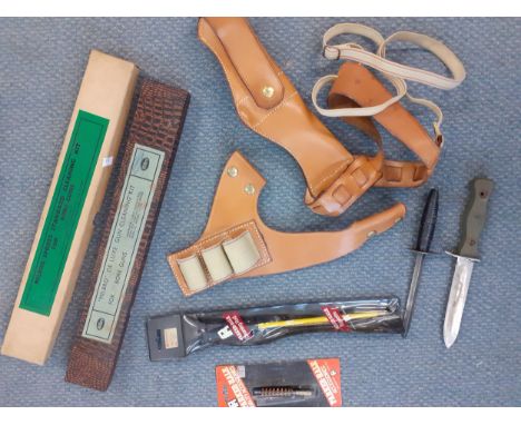 Sold at Auction: Lot of Knives Holster & Shotgun Cleaning Kit