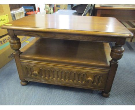 An Ercol elm stained drop flap corner unit with two shelves and drawer below 48cm h x 73.5cm w, together with an Ercol stoolL