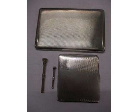 A Goldsmiths &amp; Silversmiths 1930s silver cigarette case, another silver cigarette case and two Victorian propelling penci