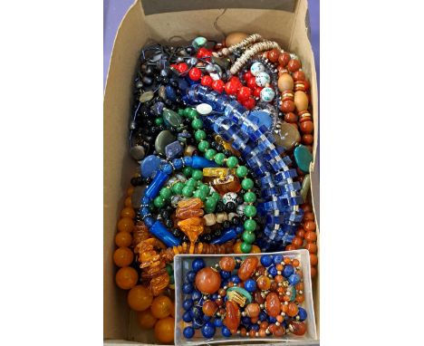 ASSORTMENT OF BEAD NECKLACESincluding amber coloured beads, chinese hand painted ceramic beads, agate, lapis lazuli and a pai