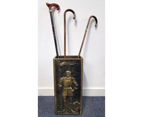 TWO VINTAGE WALKING STICKSone with silver collar and tip, the other with silver tip (indistinct marks); together with an ambe
