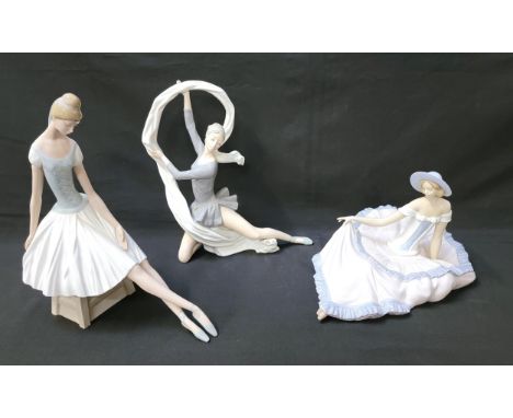 THREE LARGE NAO BALLERINA FIGURINESconsisting of Dancer with Veil, 33cm high; Seated ballerina, 33cm high; and a seated lady 