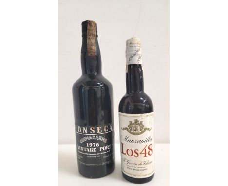 ONE BOTTLE OF FONSECA GUIMARAENS 1976 VINTAGE PORT 75cl and 21%, slight wear to label, together with a half bottle of Manzani