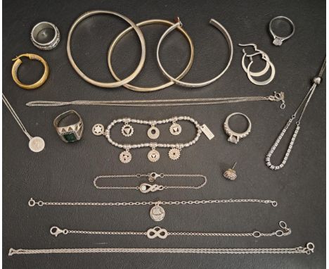 SELECTION OF SILVER JEWELLERY including three silver bangles, a single diamond set silver gilt hoop earring, a pair of silver