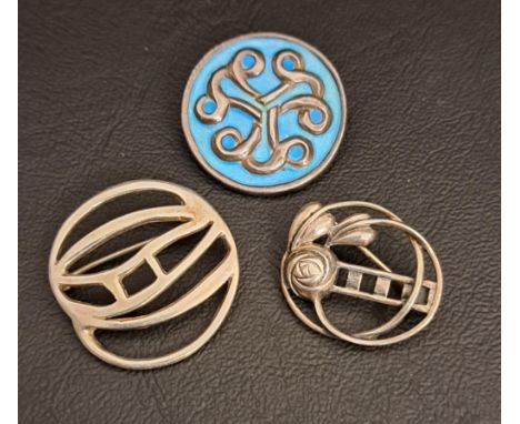 IAIN MACCORMICK IONA SILVER BROOCHwith Celtic entwined motif and turquoise enamel decoration, together with two Charles Renni