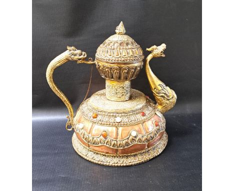 TIBETAN CEREMONIAL DRAGON TEAPOTin copper and brass, with a monumental dragon handle and spout, with a circular lift off lid 