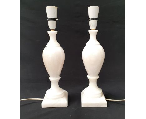 PAIR OF ALABASTER TABLE LAMPSof baluster design and square bases, 30cm to light fitting