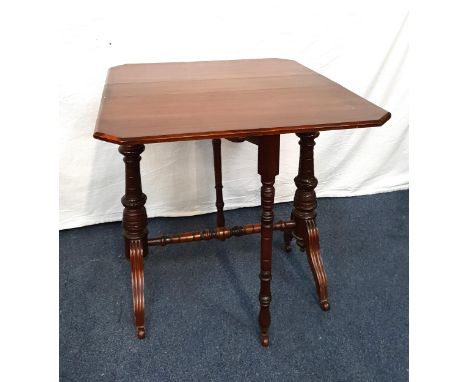 VICTORIAN MAHOGANY GATE LEG FOLD DOWN OCCASIONAL TABLEwith elaborate turned legs on castors, 69 x 61 x 61cm extended