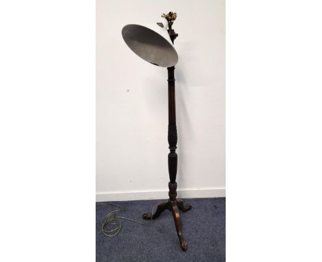 EDWARDIAN MAHOGANY STANDARD LAMPwith fluted details and wheat sheafs on pedestal feet with ball and claw, topped with a white