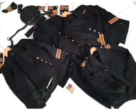 LARGE SELECTION OF 1940s/50s NAVY UNIFORMS AND ACCESSORIEScomprising one great coat, four jackets and trousers, two Battle dr