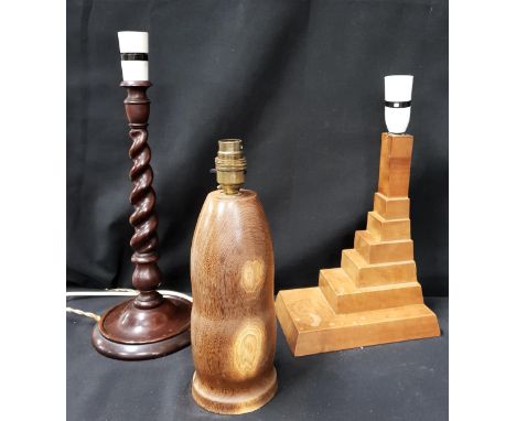 THREE VINTAGE WOODEN TABLE LAMPSincluding a Laburnum turned lamp by Len Skeels, Isle of Seil, 22cm high to light fitting; An 