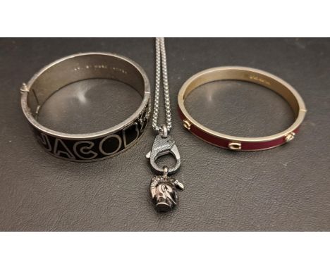 SELECTION OF FASHION JEWELLERYcomprising a Marc by Marc Jacobs bangle, a red enamel set Coach bangle, and a Diesel necklace