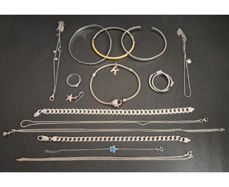 SELECTION OF SILVER JEWELLERYincluding three bangles, a pair of CZ set hoop earrings, two curb link bracelets, an opal set tu