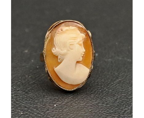 CAMEO DRESS RINGthe shell cameo depicting a female bust in profile, on ten carat gold shank, ring size K-L and approximately 