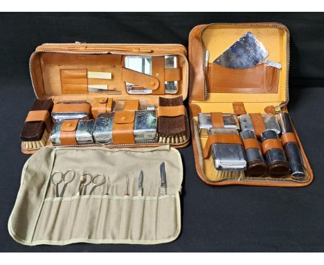 TWO VINTAGE LEATHER BOUND VANITY SETSwith chrome accessories, and a vintage scalpel set (3)