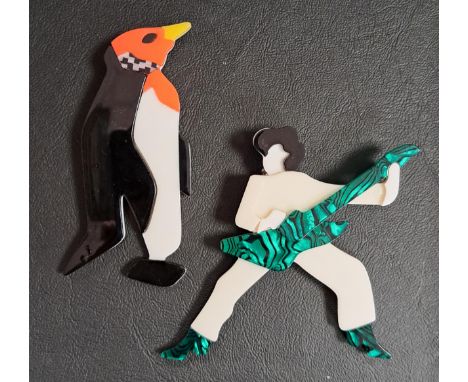 TWO LEA STEIN STYLE BROOCHEScomprising a penguin, 9.5cm high; and Elvis, 8.7cm high