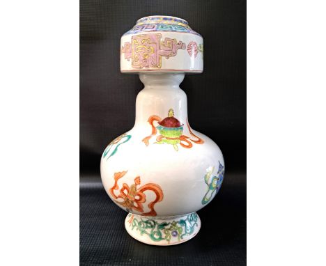 CHINESE PORCELAIN TIBETAN STYLE ALTAR VASEor Benbaping, the body decorated with the eight buddhist emblems or Bajixiang, the 