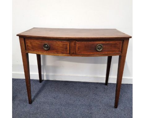 REGENCY BOW FRONTED MAHOGANY AND SATINWOOD BANDED CONSOLE TABLEthe two drawers with brass twist ring handles, on tapered legs