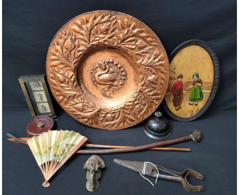 COLLECTION OF INTERESTING COLLECTABLES including an Arts and Crafts wall art copper charger, depicting a fowl catching a snak