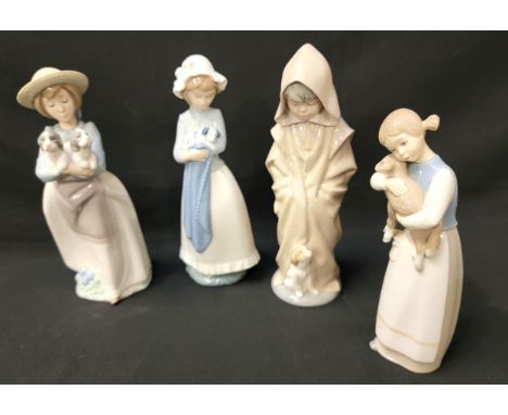 FOUR NAO FIGURINESconsisting hooded boy and puppy, 27cm; girl with puppy 26cm; girl with lamb, 21 cm; and a girl with puppies