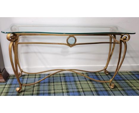 GILT FINISHED WROUGHT IRON AND GLASS CONSOLE TABLEthe shaped glass top above gilt wrought iron base complete with decorative 