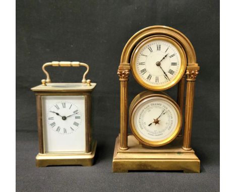 TWO SMALL CLOCKSthe first a Victorian 8 Day Movement Carriage style, in a brass case with glass panels to each side as well a