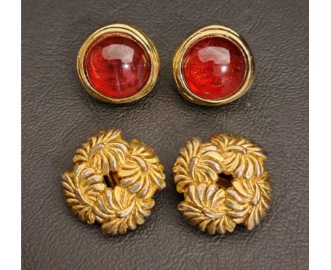 PAIR OF 1980s CHRISTIAN DIOR CLIP ON EARRINGSwith red cabochons surrounded by gold plate, signed Chr.© Dior Germany, 3.5 cm d