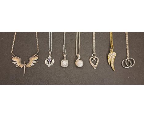 SEVEN SILVER MOUNTED PENDANT ON CHAINSincluding a CZ cluster pendant, a heart shaped example, a pearl and CZ pendant and CZ s