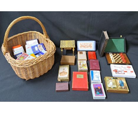 SELECTION OF VINTAGE PLAYING CARDS AND OTHER GAMES  AND ACCESSORIEScomprising five double packs of playing cards, twenty sing