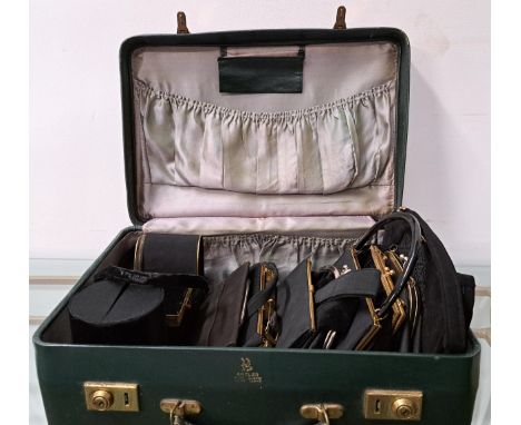 SELECTION OF TWELVE VINTAGE BLACK EVENING BAGSof various designs, contained in an Antler suitcase