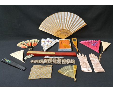 SELECTION OF FANS, GLOVES AND OTHER VINTAGE ACCESSORIEScomprising ten fans, a ladies white metal belt, a bead work evening ba