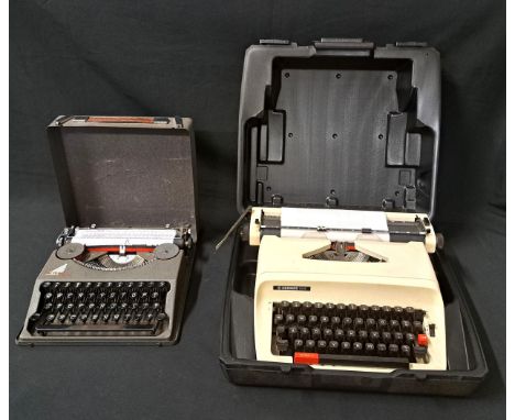 TWO CASED VINTAGE TYPEWRITERScomprising a Hermes 305 and a Hermes Baby (2)