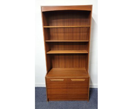 MID CENTURY AVALON BOOKCASE OVER CUPBOARDwith internal light fitting, the open shelves over two door cupboard, 84 x 178 x 40c