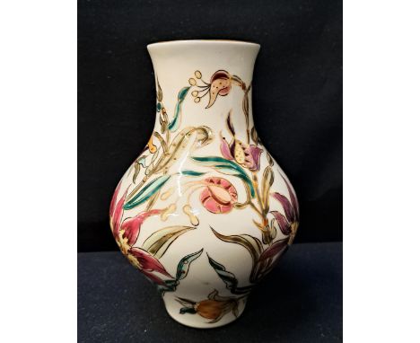 HUNGARIAN ZSOLNAY BALUSTER VASEnumbered 9566/00811, with gilt and floral decoration on cream ground, 18cm high