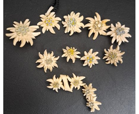 SET OF MID CENTURY ENAMEL DECORATED RESIN BROOCHES AND PENDANTS ATTRIBUTED TO LINE VAUTRIN (1913-1997)all in the form of Edel