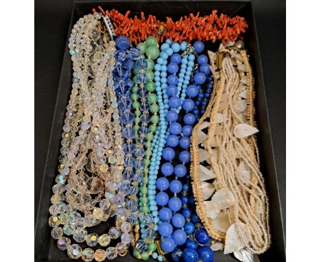 SELECTION OF VINTAGE NECKLACEScomprising five clear crystal examples, one a triple strand necklace; four blue glass bead neck