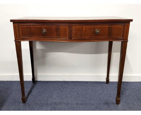 SERPENTINE FRONTED MAHOGANY REGENCY STYLE CONSOLE TABLEwith banded detail, and two lined cutlery drawers, raised on plain tap