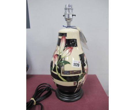 A Moorcroft Pottery Table Lamp, painted in the 'Stargazer Lily' pattern designed by Vicky Lovatt, L117/9 (RRP £695).