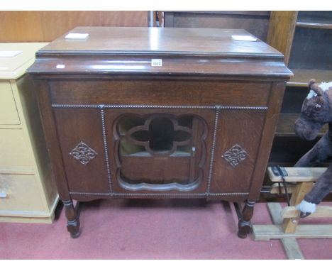 Gilbert &amp; Co of Sheffield Model 77 Gramophone, in oak freestanding cabinet, circa 1920's with lift-up lid and sliding doo