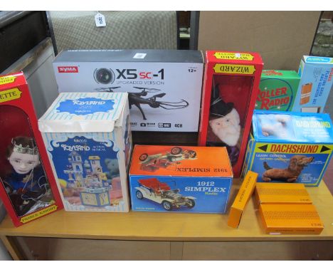 A Syma Boxed Drone, Simplex 1912 radio, Toyland action musical, Roller radio, etc.