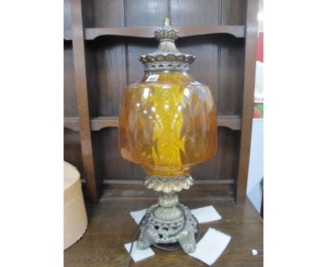 XX Table Lamp, with amber glass shade, on gilded base with scroll feet, 65cm high.