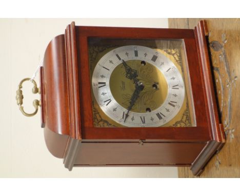 Mahogany cased bracket clock, engraved dial signed 'Lonsdale England', triple train driven movement chiming on rods, movement