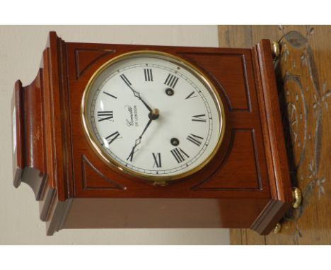 Regency style mahogany cased bracket clock, dial signed 'Comitti of London', twin train movement striking the hours and halve